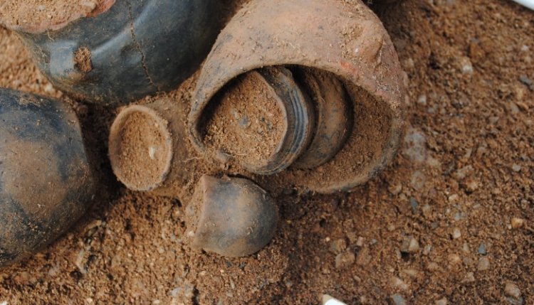 bronze and clay items that had been deposited into the graves.