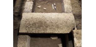 The skeletal remains were found both inside and outside the rectangular stone-lined cist (pictured), under the floor of the cavernous, vaulted structure that is 26 feet (eight metres) tall. They are undergoing DNA analysis