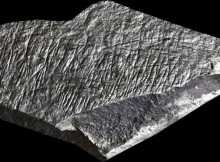 A brief visualisation of an exotic stone found at a 15,000-year-old hunter-gatherer settlement in Jersey. The site, Les Varines, offers great views over landscapes now drowned by the English Channel. It is located in the Jersey parish of St Saviour and has produced over 5,000 scattered stone artefacts during the past five years of excavation, but in the summer of 2015 the team unearthed denser concentrations of tools and burnt bone and, for the first time, fragments of engraved stone. These are currently under study in an attempt to unravel the significance of these unique finds.