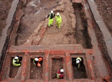 Foundations of the 20th-century brick prison built on top of medieval castle keep wall. Credits: Cotswold Archaeology