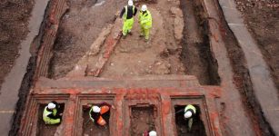 Foundations of the 20th-century brick prison built on top of medieval castle keep wall. Credits: Cotswold Archaeology