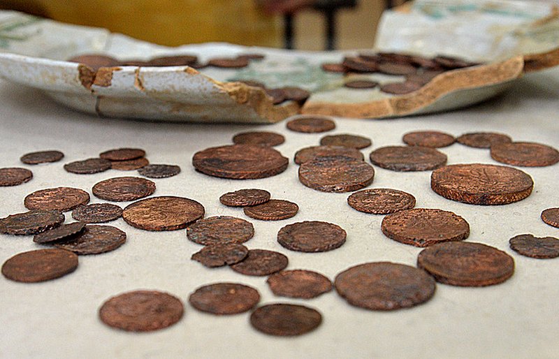 Archaeologists stumble upon 16th century coins stashed in ivory chess piece. Image credit: TASS
