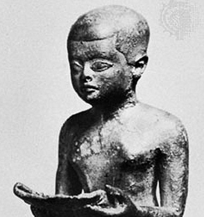 Imhotep reading a papyrus roll, detail of a sculpture; in the Egyptian Museum, Berlin. Ägyptisches Museum, Staatliche Museen zu Berlin—Preussischer Kulturbesitz
