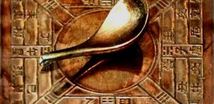 A Han dynasty magnetic compass, the needle is in the form of a carefully balanced ladle that points south. The compass shows divisions for use in Feng Shui and Yi Jing.