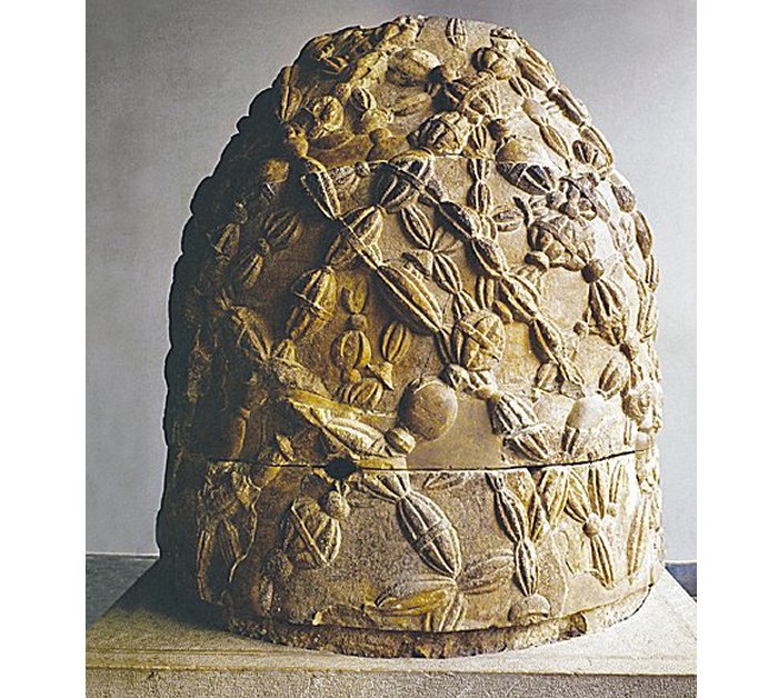 This egg-shaped stone—the very stone described by the Greek writer Pausanias, who visited Delphi in the second century A.D. The original omphalos stone, now lost, was probably an archaic cult object that supplicants draped with wreaths, resembling the wreaths carved in relief on this stone. (Erich Lessing)