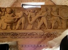 Frieze-archivatre representing Cupids, from the first order of the cells internal decoration from. Image via Wikipedia