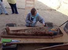 Wooden Coffin With Greco-Roman Mummy Wearing Mask Depicting Sky God Discovered In Egypt