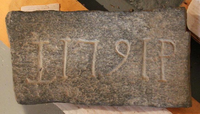 Chimney stone from a Dudleytown house. Collection of Cornwall Historical Society.