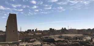 The excavation site at Tell Edfu (with the temple of Horus and the modern town of Edfu in the background). Photo byG. Marouard