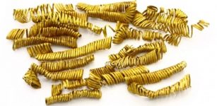 The golden spirals are each approximately 3cm long and weigh 0.1 grams each. Photo: Vestsjællands Museum