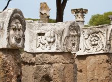 There is also the well-preserved amphitheater, built in the AD 1st and 2nd centuries, with 2,700 seats. Several giant marble theater masks still survive on tufa columns at the stage.