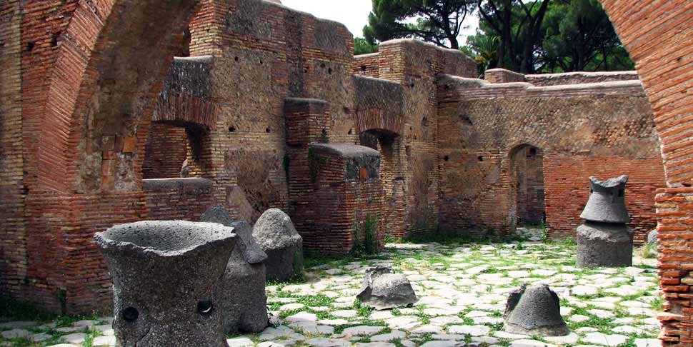 A bakery with millstones out back at Ostia Antica. Photo credits: Patrick Denker