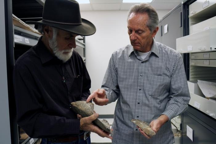 Retired San Diego Natural History Museum Paleontologist Richard Cerutti (L) and Curator of Paleontology and Director of PaleoServices, Dr.Tom DemŽrŽ compare mastodon bones salvaged at the Cerutti Mastodon site in San Diego County, California, U.S., in this handout photo received April 26, 2017. San Diego Natural History Museum/Handout via REUTERS