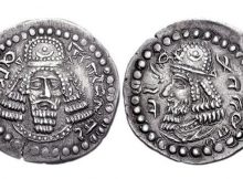 Initial coinage of founder Ardashir I, as King of Persis Artaxerxes (Ardaxsir) V. Circa CE 205/6-223/4. Obv: Bearded facing head, wearing diadem and Parthian-style tiara, legend "The divine Ardaxir, king" in Pahlavi. Rev: Bearded head of Papak, wearing diadem and Parthian-style tiara, legend "son of the divinity Papak, king" in Pahlavi