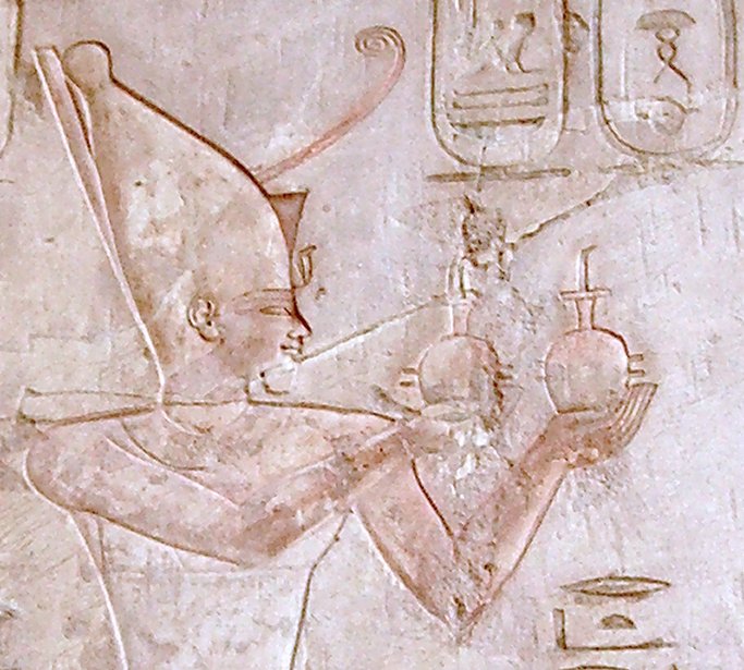 Relief of Psamtik I making an offering to Ra-Horakhty (Tomb of Pabasa). 