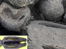 Never-Before-Seen Strange 5,000-Year-Old Clay Figurine With A Tattooed Face And Bone Mask Found In Siberia