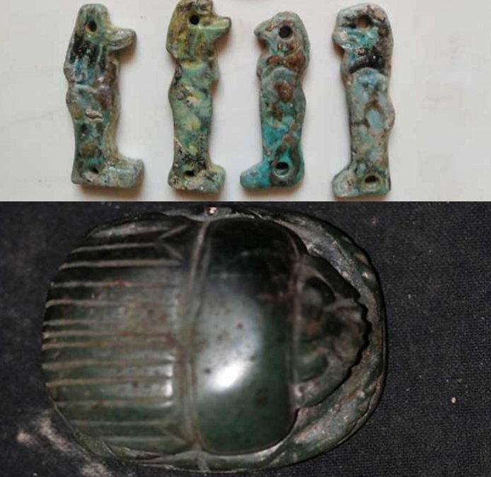 Amulets, figurines in sarcophagus in Minya