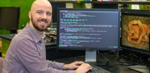 George Long, a graduate student of bioinformatics at McMaster, is the lead author of a study that identified and reconstructed the first ancient genome of E. coli using fragments extracted from the gallstone of a 16th century mummy. (Photo by Georgia Kirkos/McMaster University)